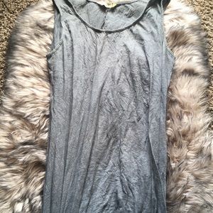 Long sleeveless dress.